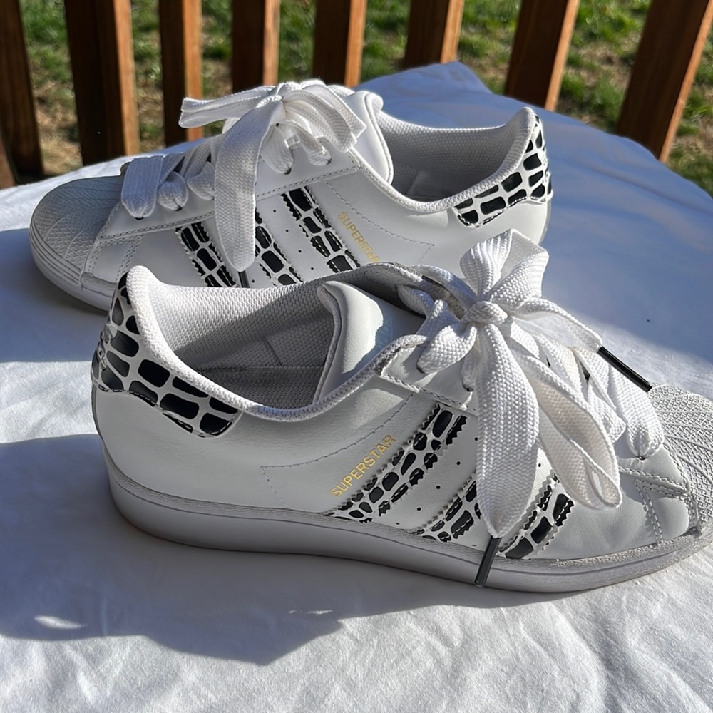 Adidas Superstar-Animal print. Worn once.  Excellent condition. Size 7.5